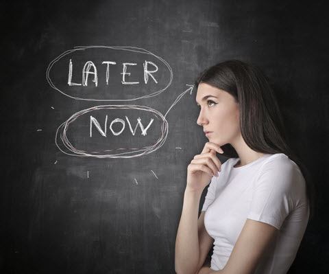 Woman Looking At Chalk Board With 